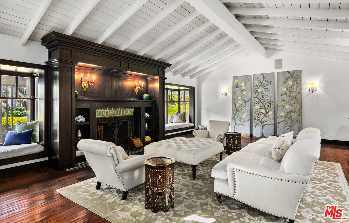 6172 Bonsall Drive Malibu, CA 90265 - Photo 12 of 40 a living room with furniture and a flat screen tv