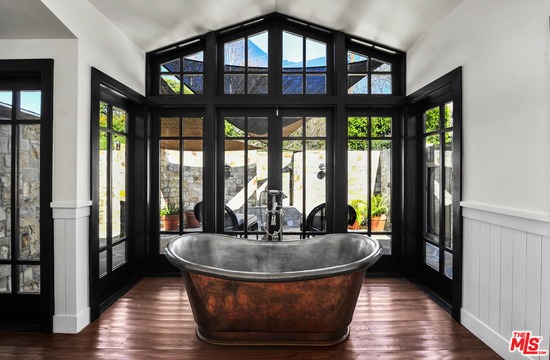 6172 Bonsall Drive Malibu, CA 90265 - Photo 35 of 40 a view of living room and kitchen with furniture