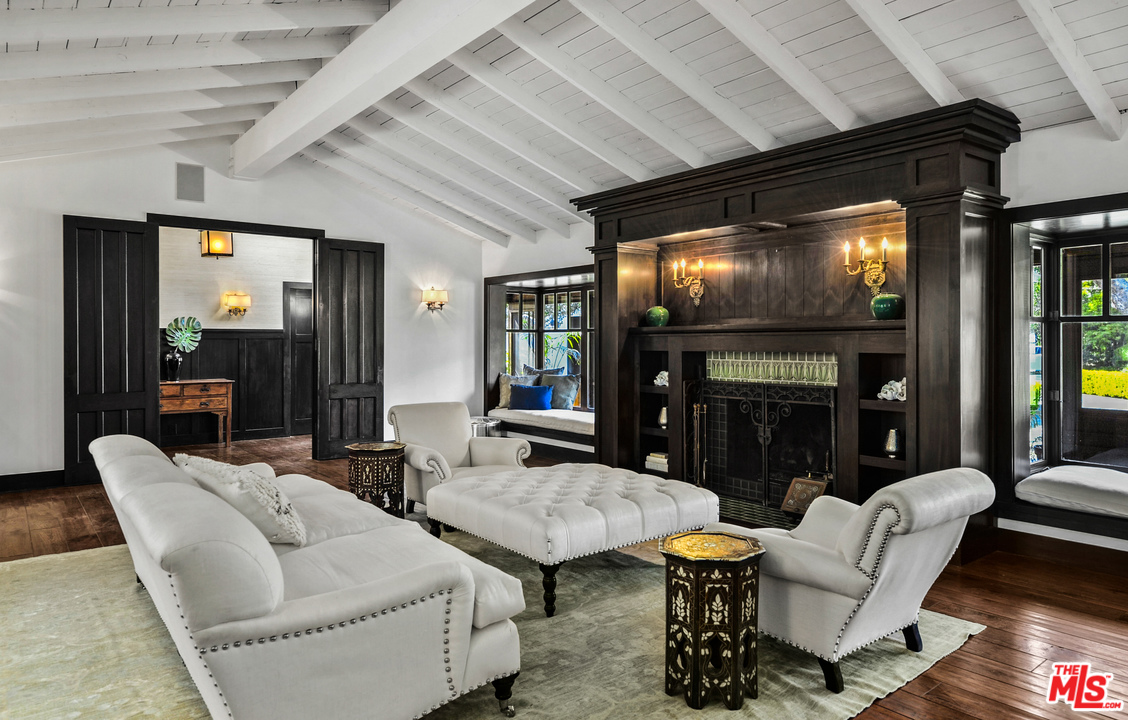 6172 Bonsall Drive Malibu, CA 90265 - Photo 10 of 40 a living room with furniture and a flat screen tv