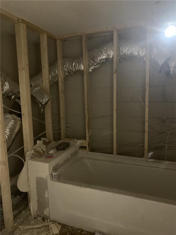 529 Hawkins Store Road Northeast Kennesaw, GA 30144 - Photo 15 of 18 a bathroom with a sink and shower