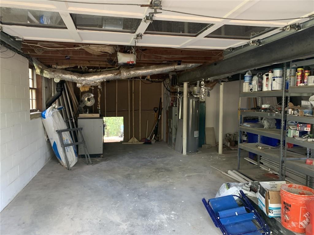 529 Hawkins Store Road Northeast Kennesaw, GA 30144 - Photo 16 of 18 a view of a room with gym equipment