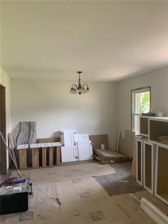 529 Hawkins Store Road Northeast Kennesaw, GA 30144 - Photo 6 of 18 a room with furniture and air hockey table