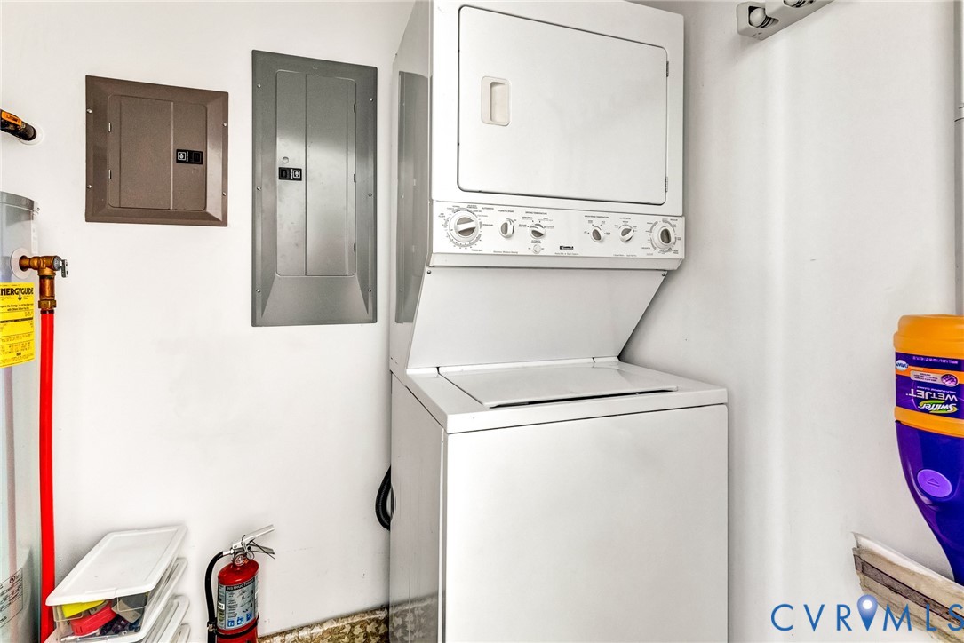 233 Washington Street Reedville, VA 22539 - Photo 18 of 35 Dedicated laundry room featuring a stackable washe