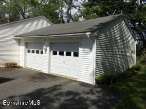 281 Whitman Road Hancock, MA 01267 - Photo 2 of 15 a view of a house with a garage