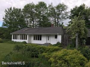 281 Whitman Road Hancock, MA 01267 - Photo 4 of 15 a house with trees in the background