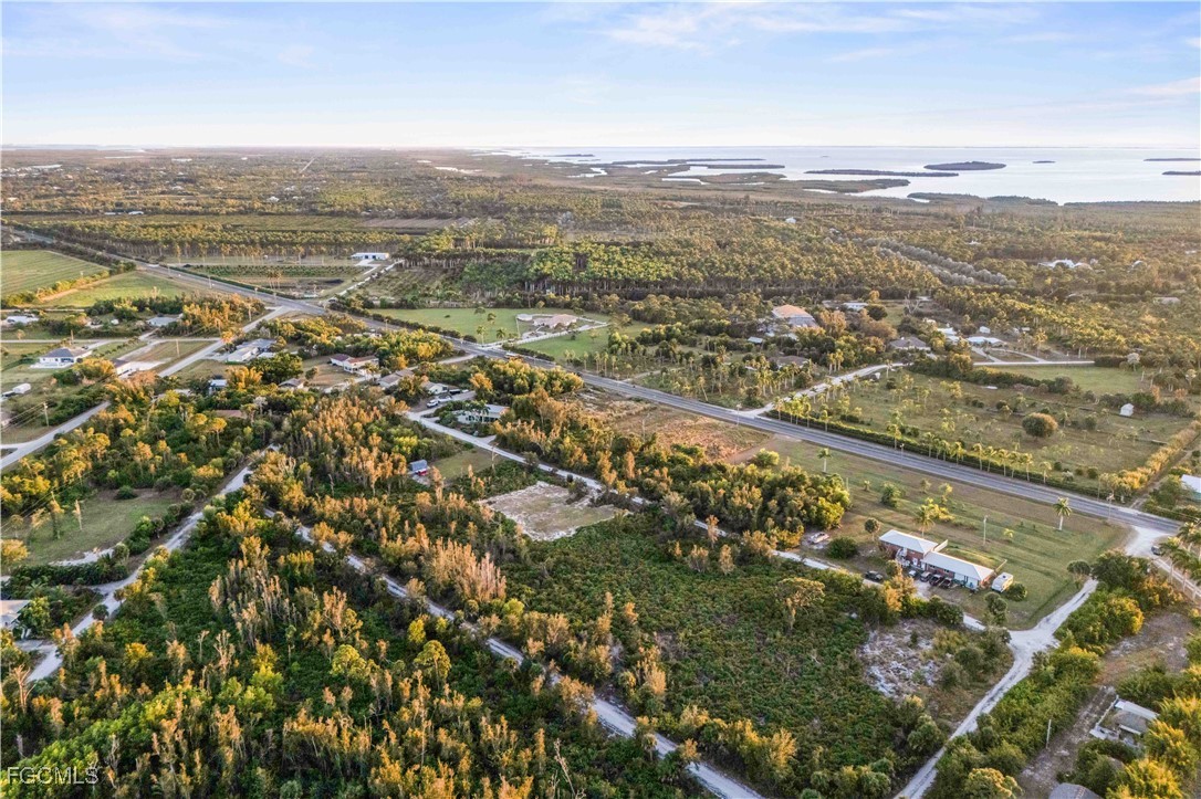 13721 Hampton Road Bokeelia, FL 33922 - Photo 8 of 9 an aerial view of residential building with ocean view