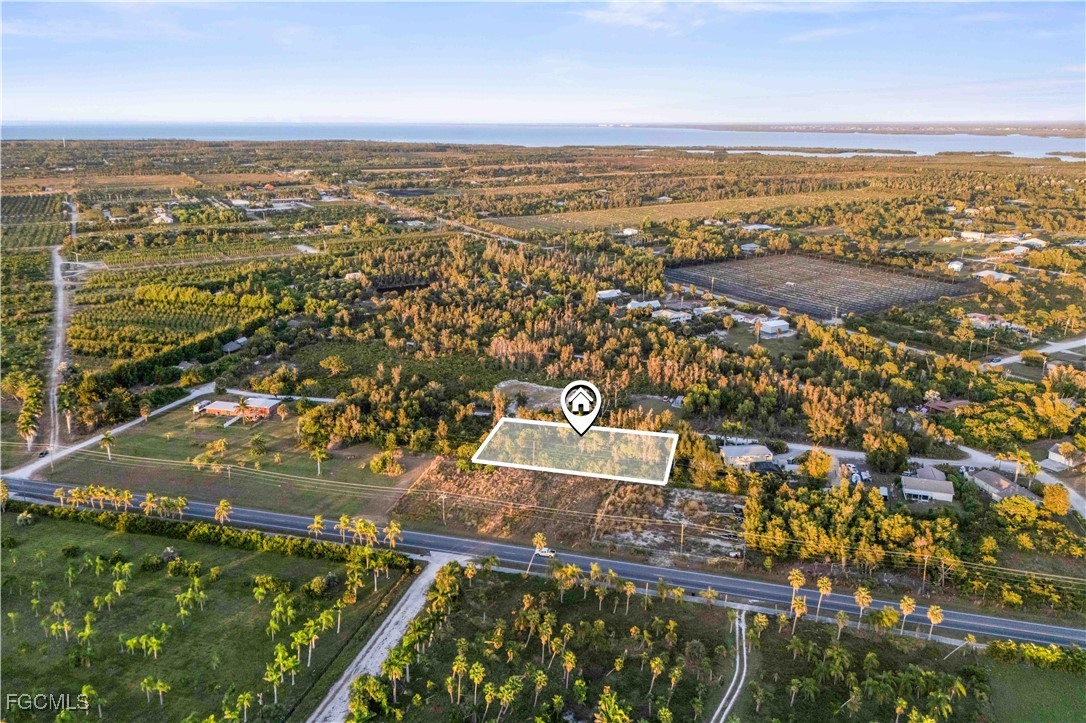 13721 Hampton Road Bokeelia, FL 33922 - Photo 9 of 9 an aerial view of residential building and ocean view
