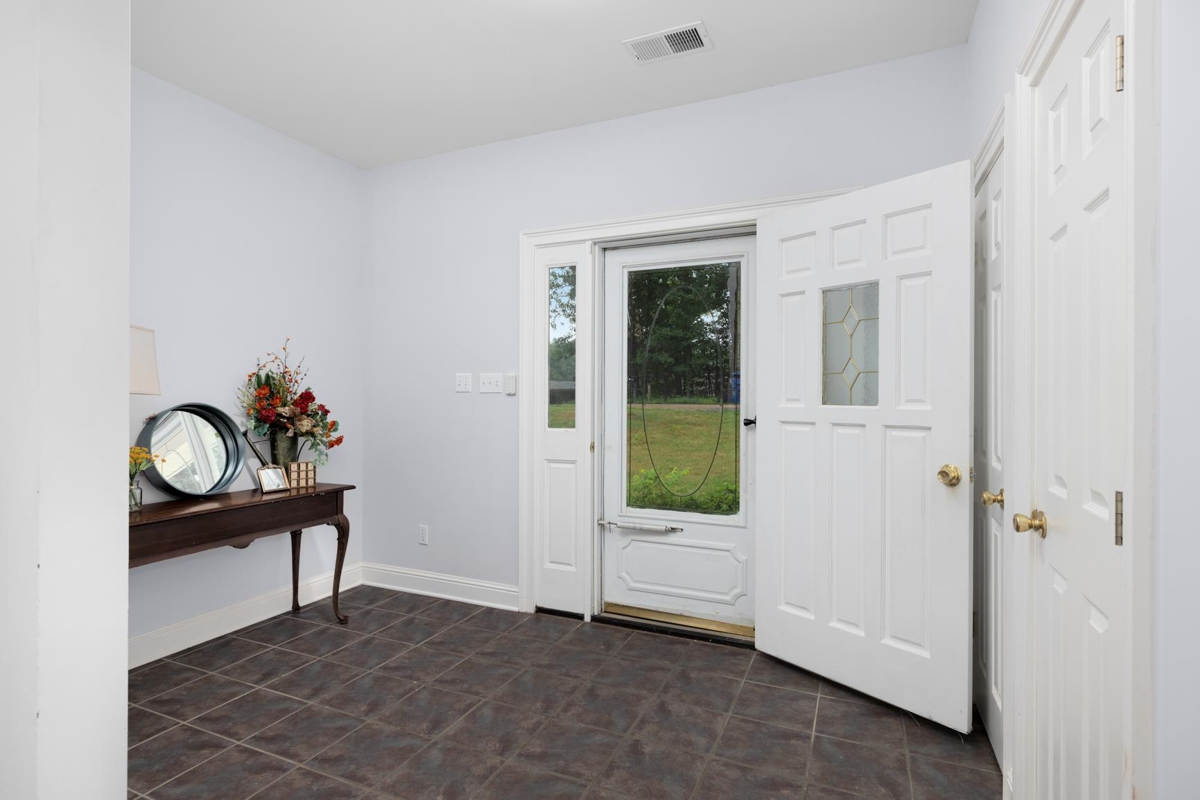 5798 North Sunset Point Memphis, TN 38135 - Photo 14 of 40 a view of an entryway with wooden floor