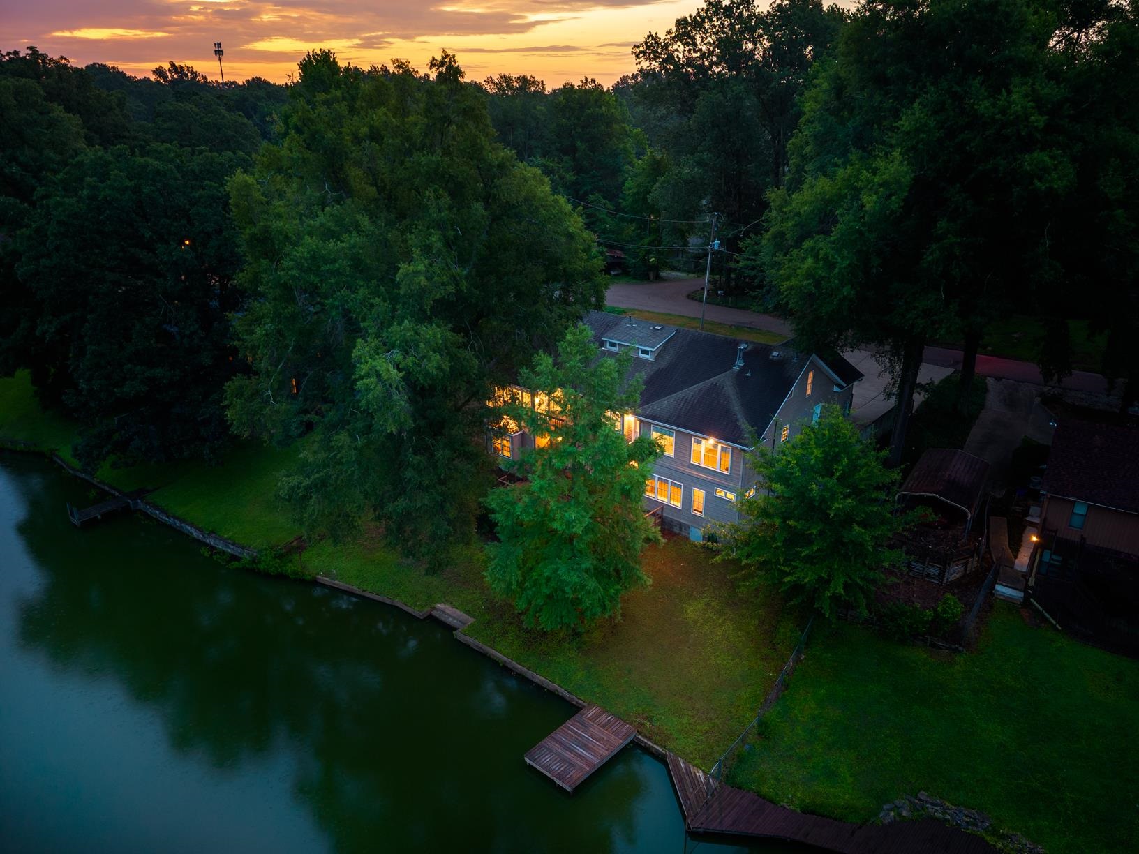 5798 North Sunset Point Memphis, TN 38135 - Photo 2 of 40 a view of a lake with a yard from balcony