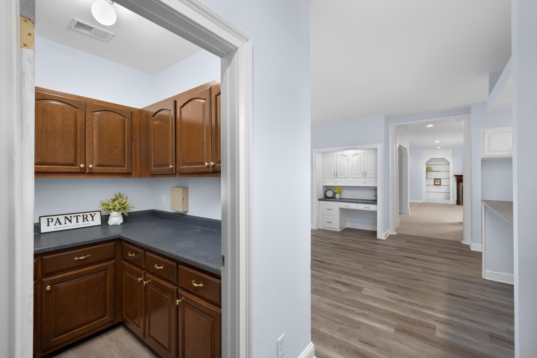 5798 North Sunset Point Memphis, TN 38135 - Photo 23 of 40 a kitchen with stainless steel appliances granite countertop a refrigerator and a stove top oven