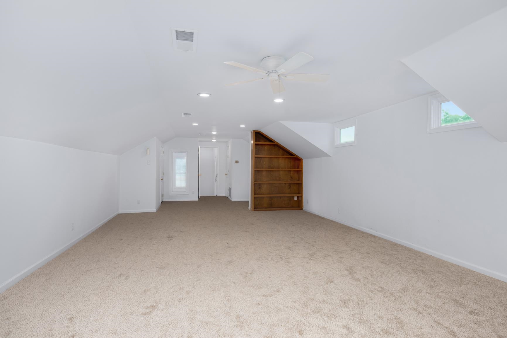 5798 North Sunset Point Memphis, TN 38135 - Photo 29 of 40 an empty room with a kitchen