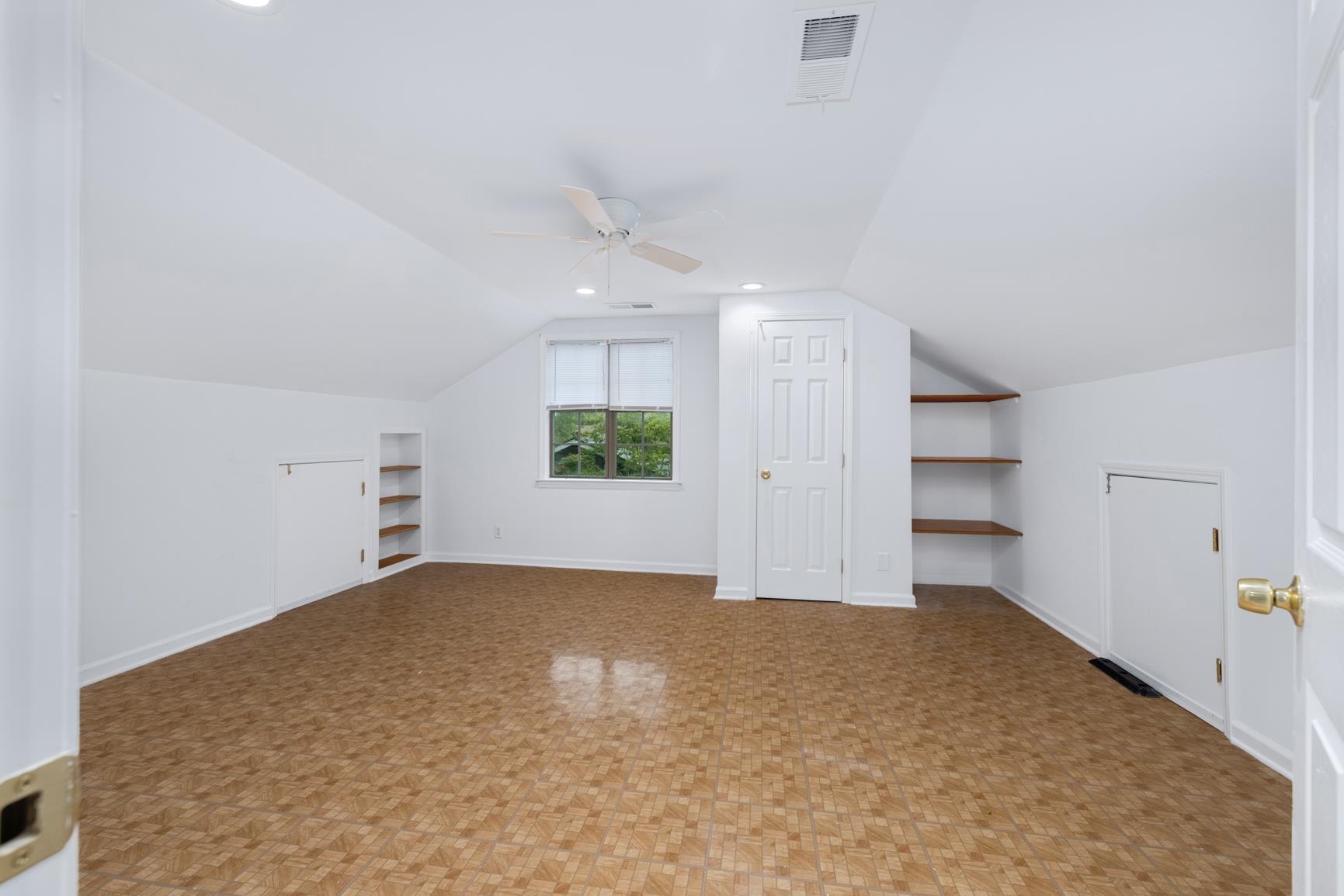 5798 North Sunset Point Memphis, TN 38135 - Photo 30 of 40 an empty room with a empty space and windows