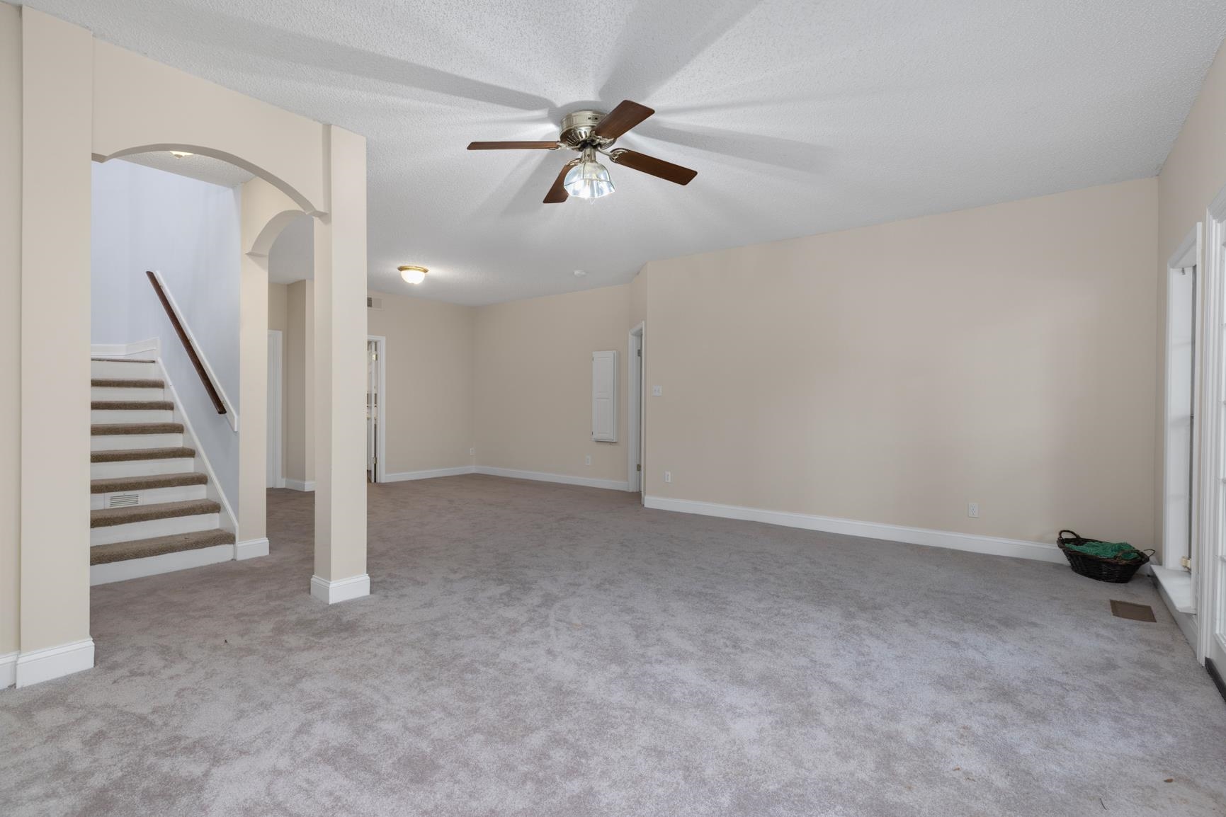 5798 North Sunset Point Memphis, TN 38135 - Photo 32 of 40 a view of an empty room with a ceiling fan