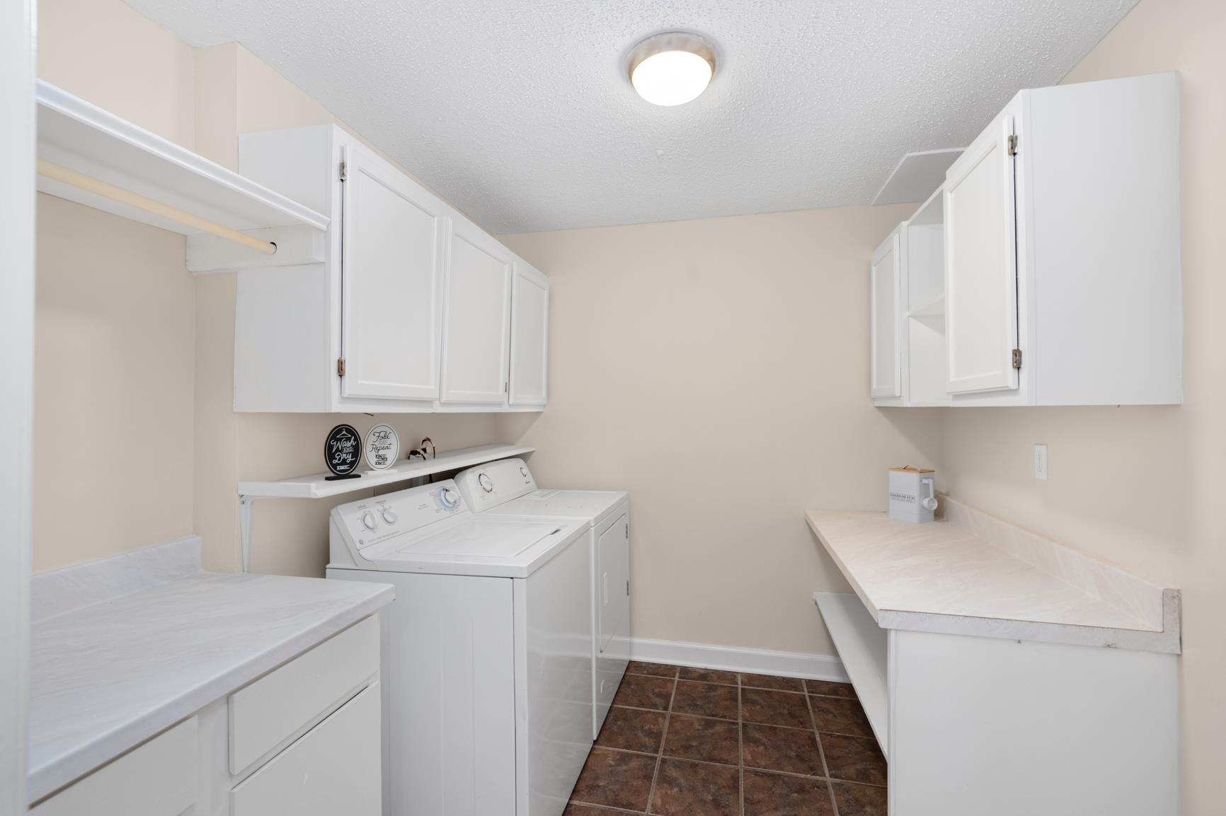 5798 North Sunset Point Memphis, TN 38135 - Photo 36 of 40 a room with storage and utility