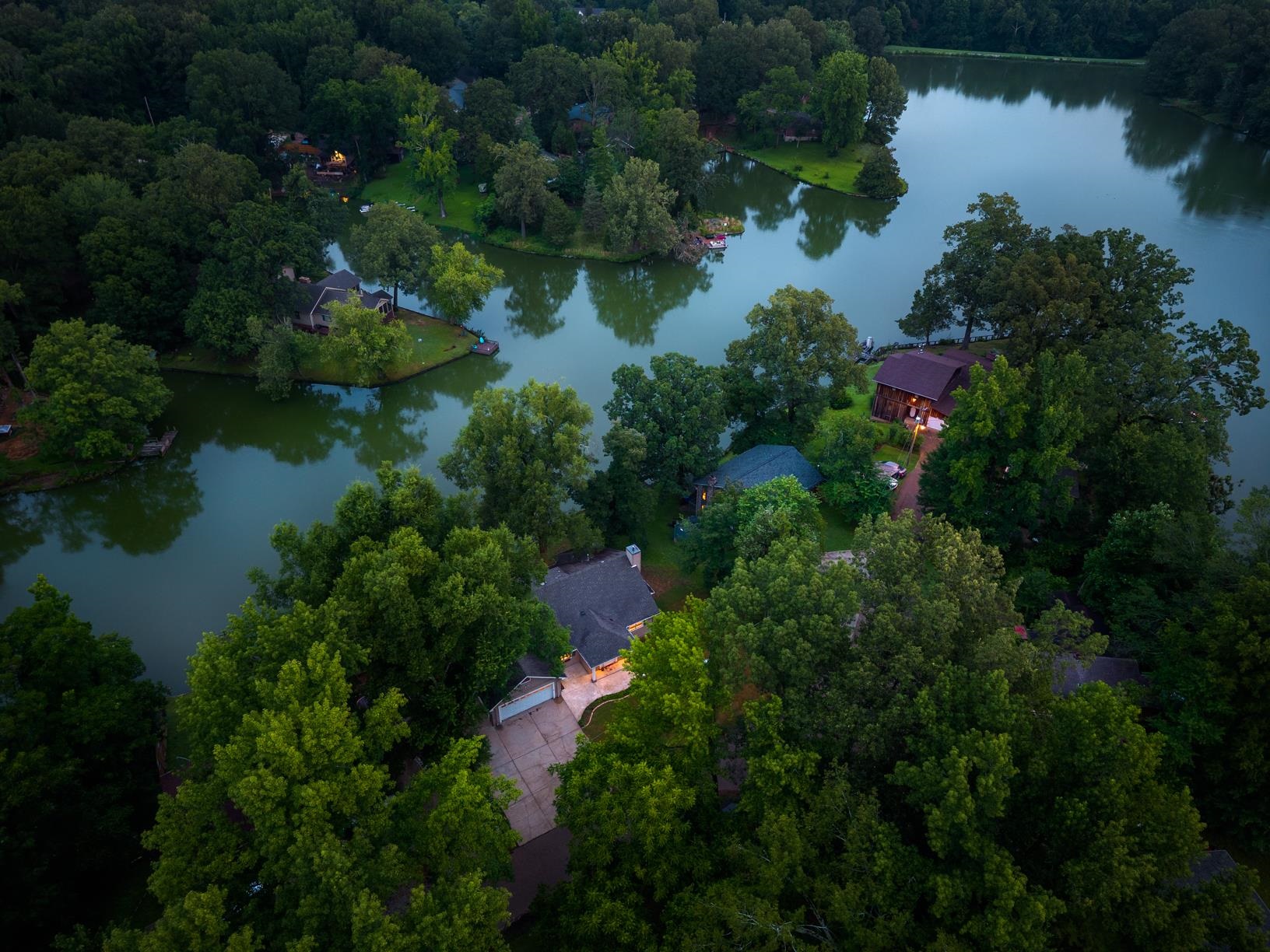 5798 North Sunset Point Memphis, TN 38135 - Photo 7 of 40 an aerial view of residential house with outdoor space and lake