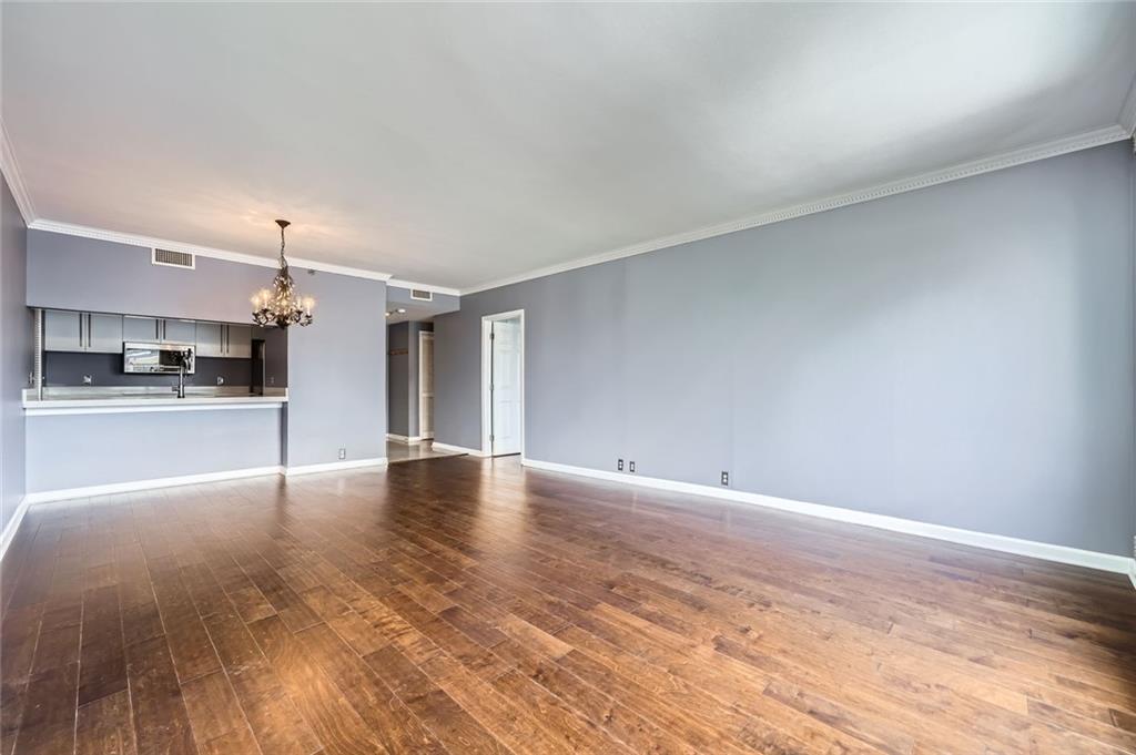 3481 Lakeside Drive Northeast, Unit 1107 Atlanta, GA 30326 - Photo 13 of 35 a view of a kitchen with a sink and a stove top oven