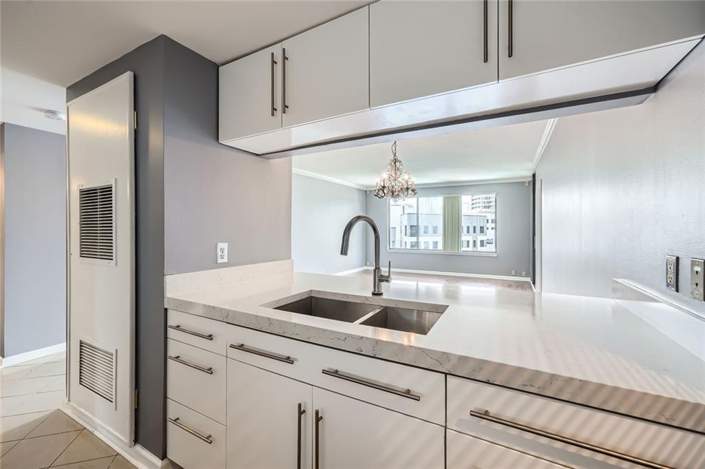 3481 Lakeside Drive Northeast, Unit 1107 Atlanta, GA 30326 - Photo 2 of 35 a close view of sink and tap