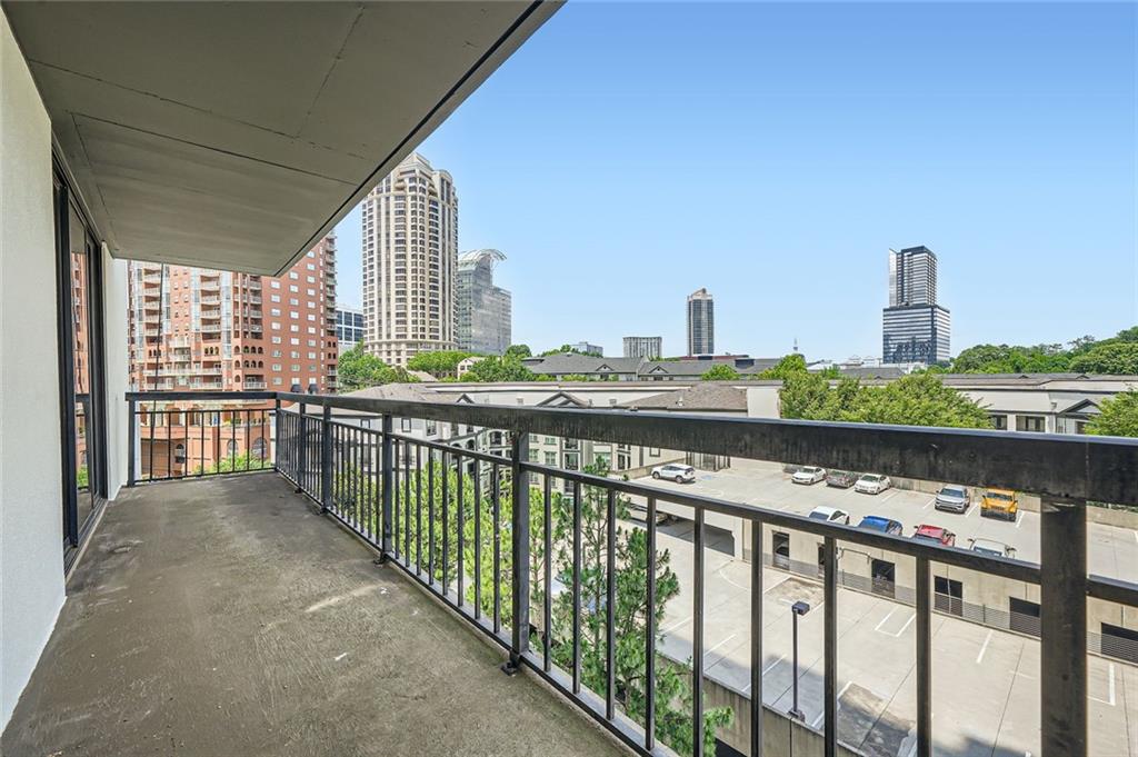 3481 Lakeside Drive Northeast, Unit 1107 Atlanta, GA 30326 - Photo 30 of 35 a city view from a balcony