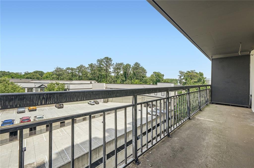 3481 Lakeside Drive Northeast, Unit 1107 Atlanta, GA 30326 - Photo 31 of 35 a balcony with outdoor space