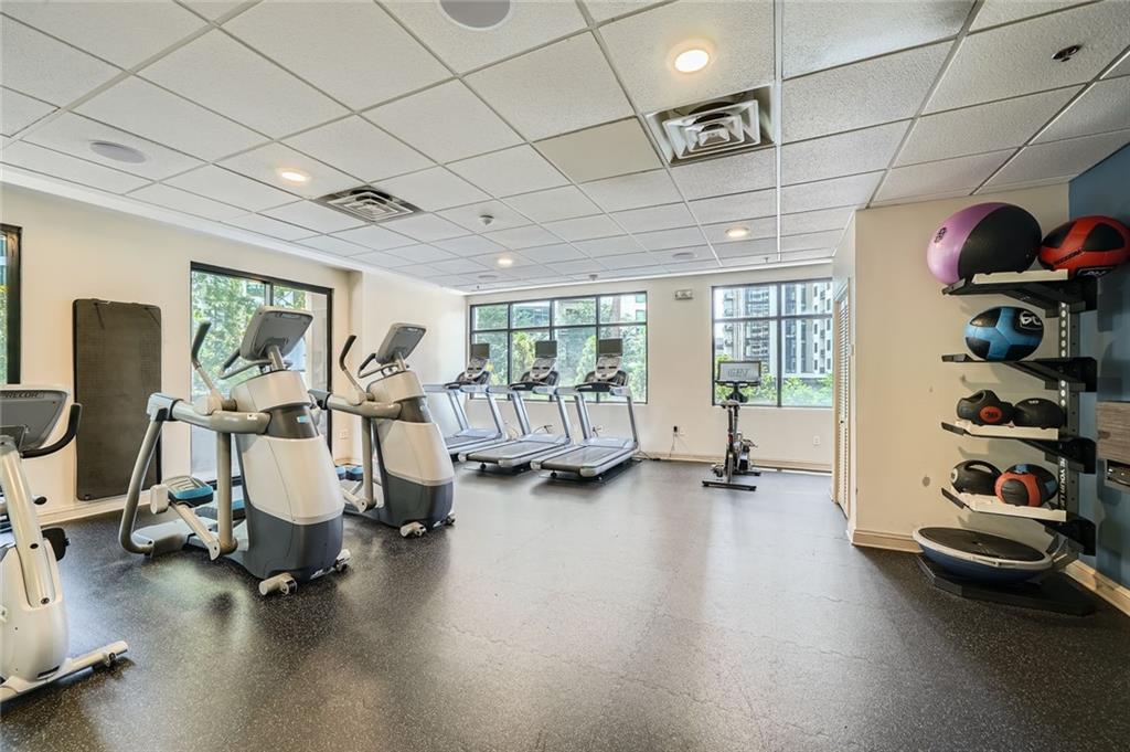 3481 Lakeside Drive Northeast, Unit 1107 Atlanta, GA 30326 - Photo 32 of 35 a view of a room with gym equipment