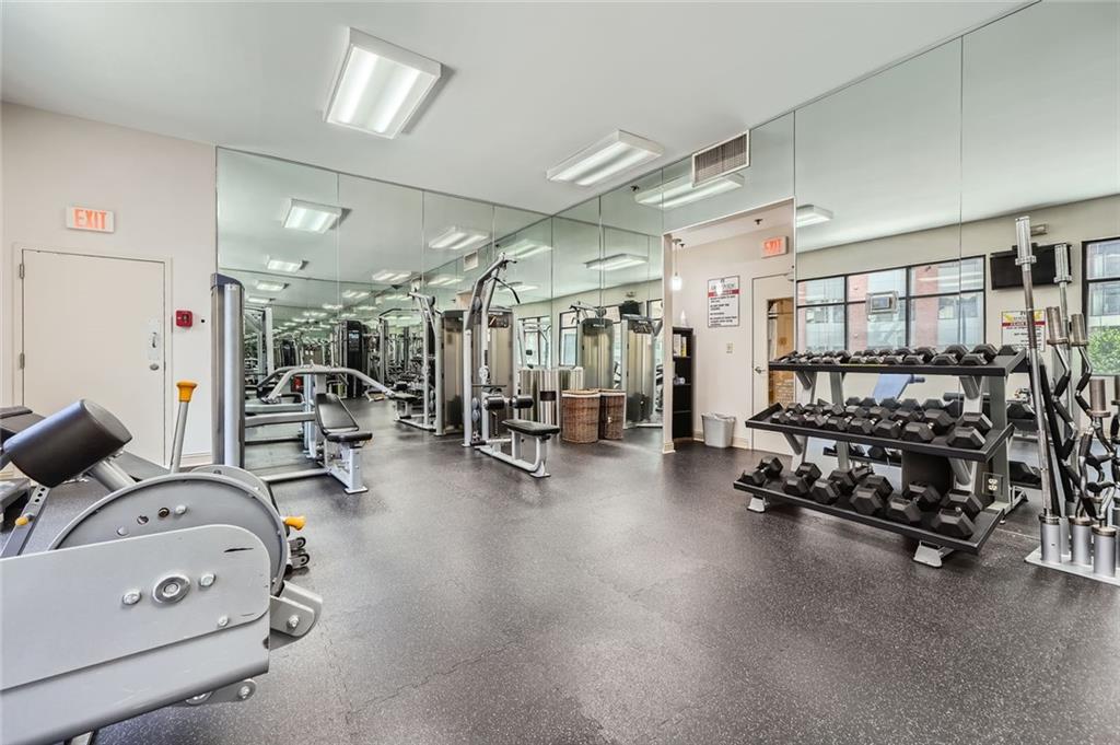 3481 Lakeside Drive Northeast, Unit 1107 Atlanta, GA 30326 - Photo 35 of 35 a view of a room with gym equipment