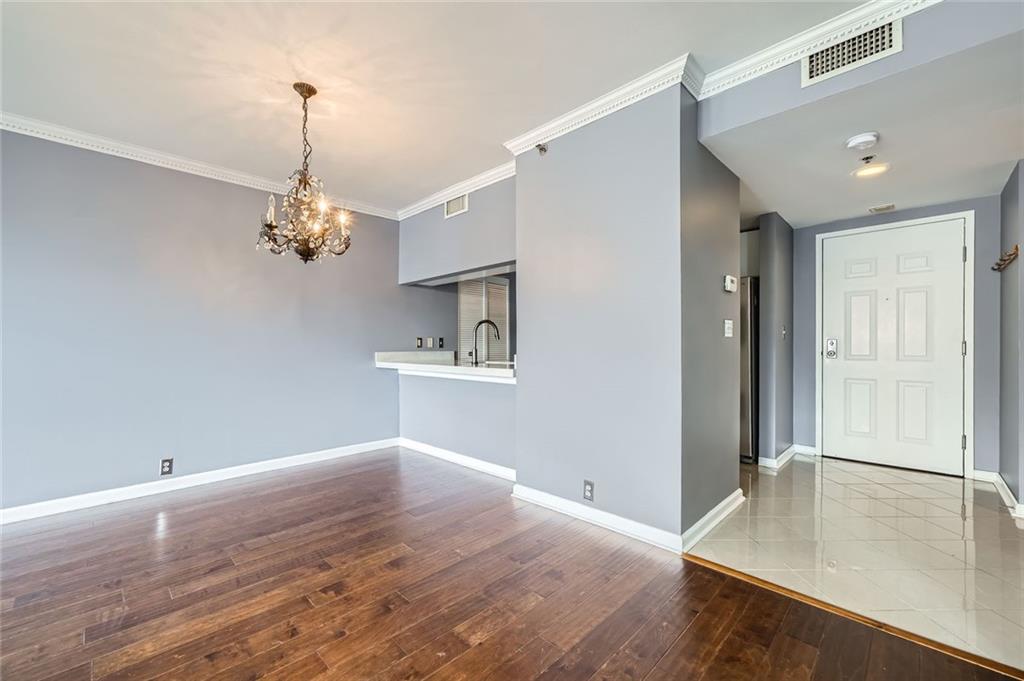 3481 Lakeside Drive Northeast, Unit 1107 Atlanta, GA 30326 - Photo 6 of 35 a view of livingroom with chandelier