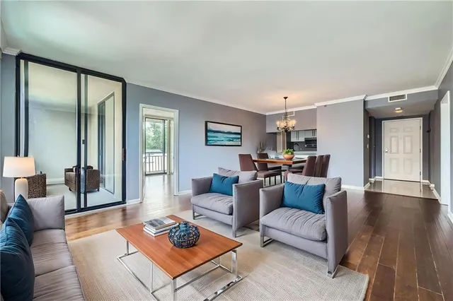 a living room with furniture and a table