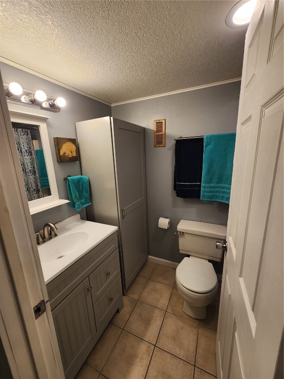 57 Copper Circle, Unit 104 Copper Mountain, CO 80443 - Photo 12 of 25 a bathroom with a toilet a sink and mirror