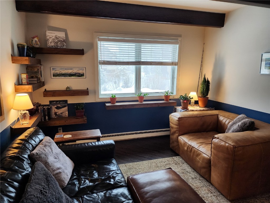57 Copper Circle, Unit 104 Copper Mountain, CO 80443 - Photo 13 of 25 a living room with furniture and a window