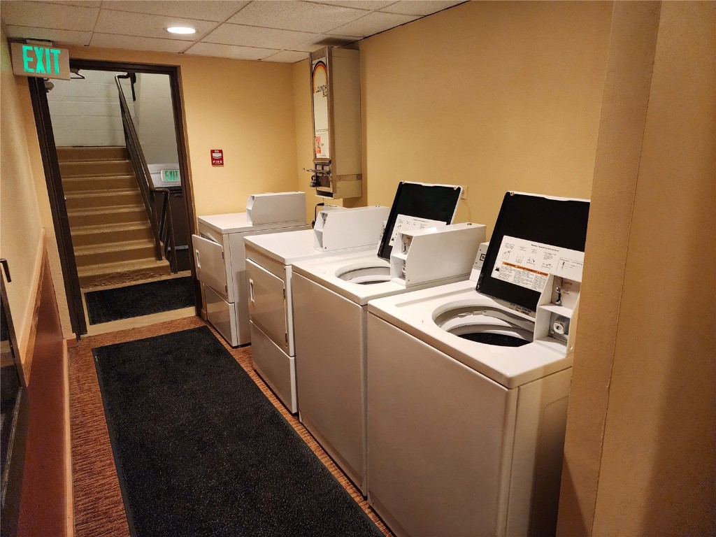 57 Copper Circle, Unit 104 Copper Mountain, CO 80443 - Photo 18 of 25 a utility room with dryer and washer