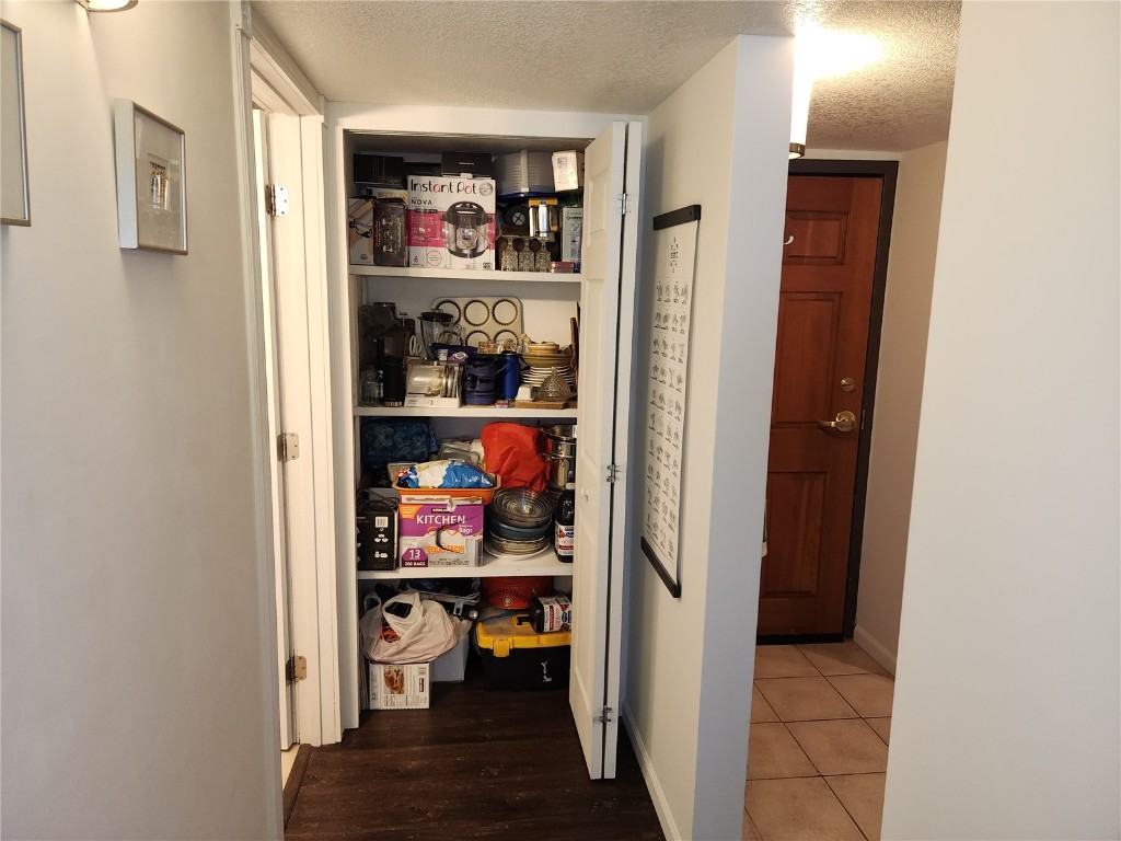 57 Copper Circle, Unit 104 Copper Mountain, CO 80443 - Photo 9 of 25 a view of a hallway with shelves