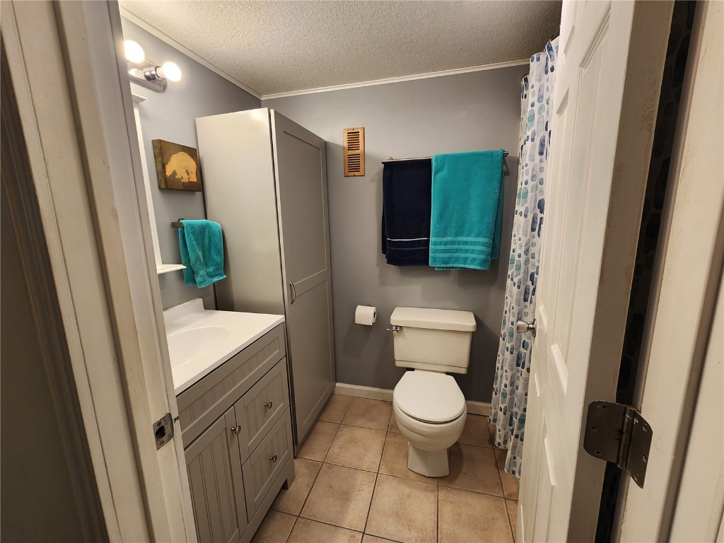 57 Copper Circle, Unit 104 Copper Mountain, CO 80443 - Photo 10 of 25 a bathroom with a toilet and a shower