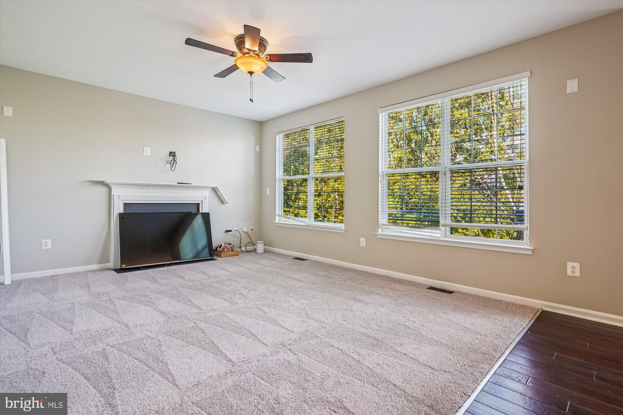 3318 Eagle Ridge Drive Woodbridge, VA 22191 - Photo 22 of 72 a view of empty room with a fireplace and a window