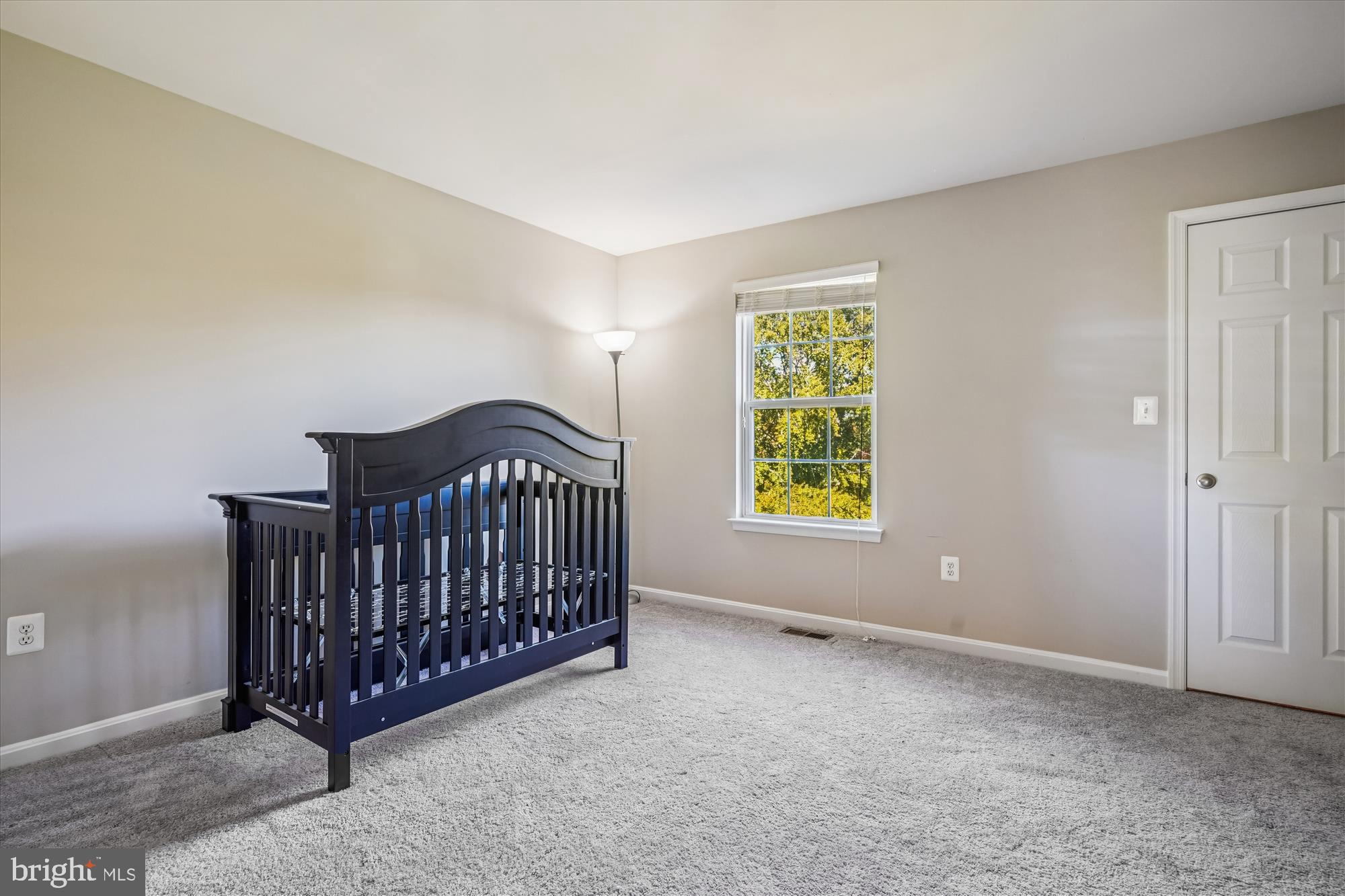 3318 Eagle Ridge Drive Woodbridge, VA 22191 - Photo 30 of 72 a bedroom with a window and a bed