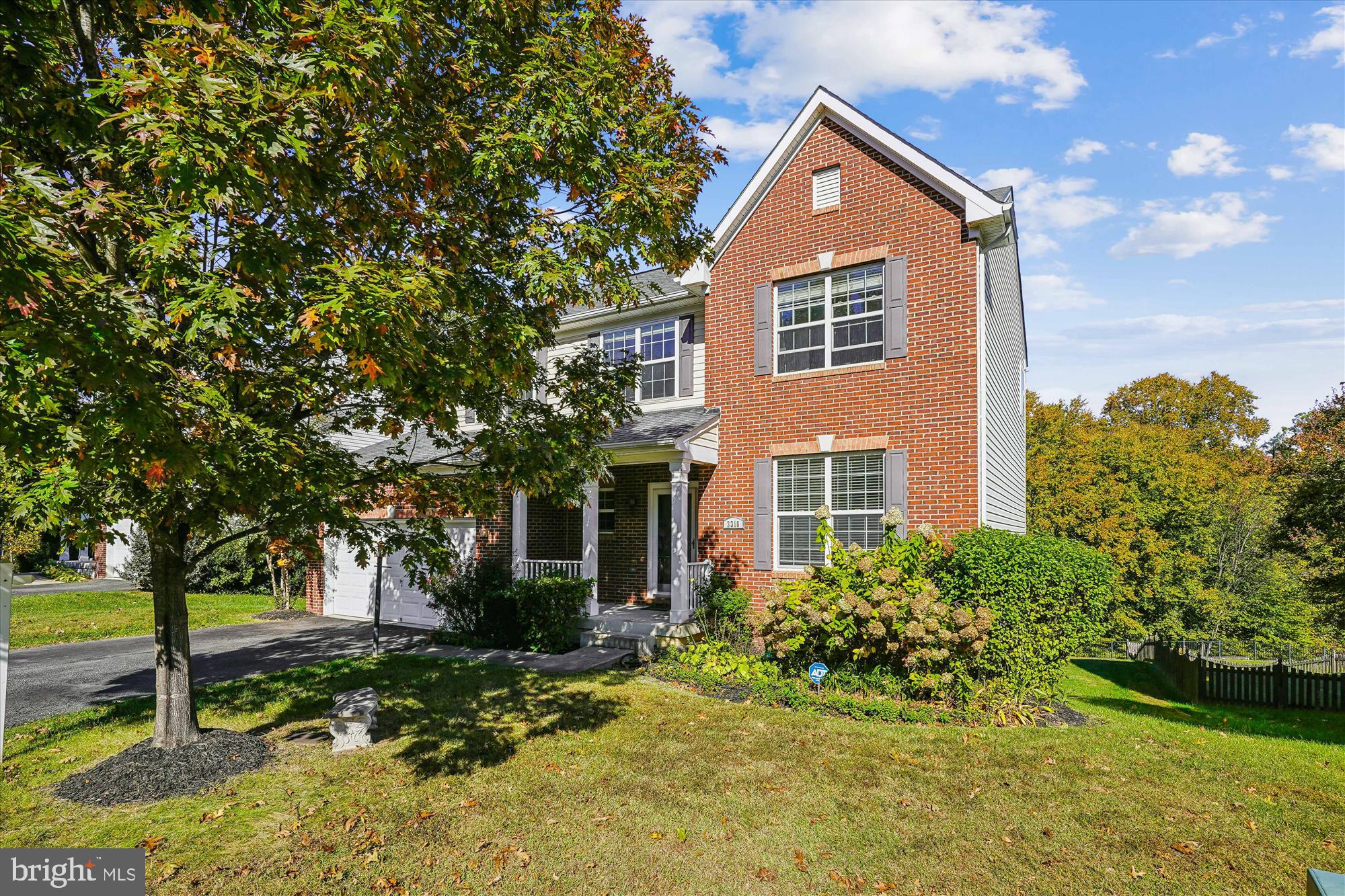 3318 Eagle Ridge Drive Woodbridge, VA 22191 - Photo 3 of 72 a front view of a house with garden