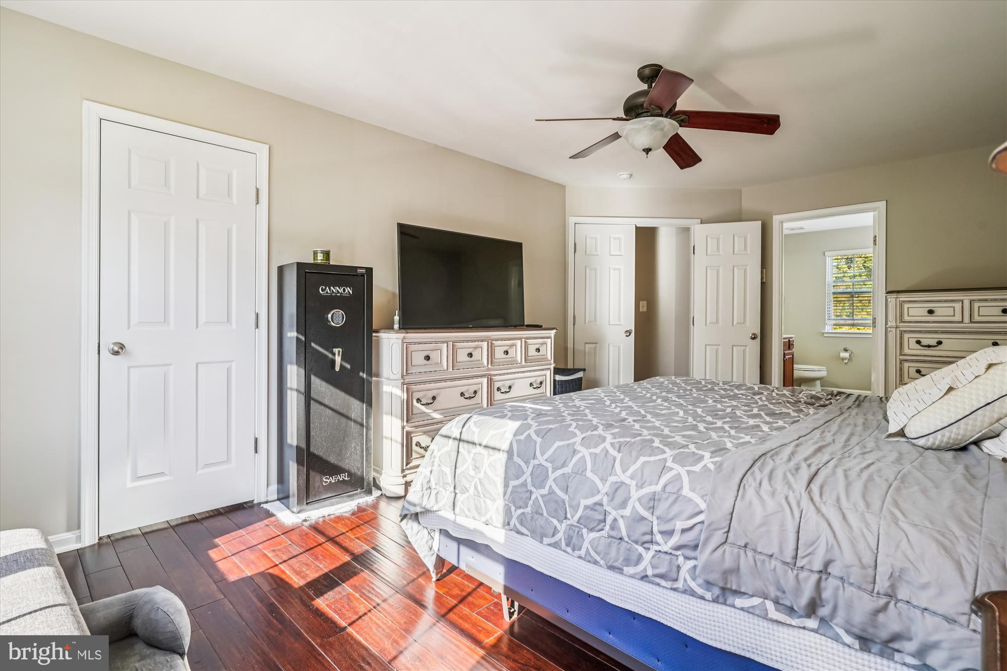 3318 Eagle Ridge Drive Woodbridge, VA 22191 - Photo 36 of 72 a spacious bedroom with a bed and a flat screen tv