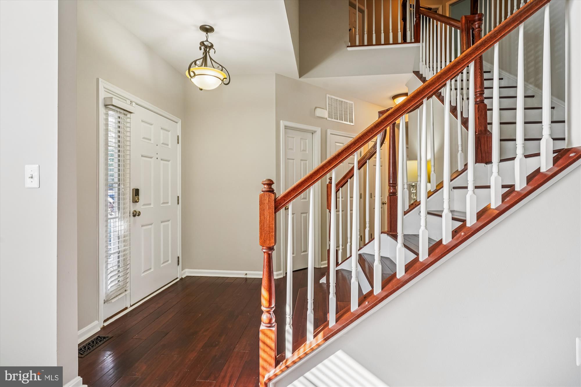 3318 Eagle Ridge Drive Woodbridge, VA 22191 - Photo 5 of 72 a view of staircase with wooden floor and stairs