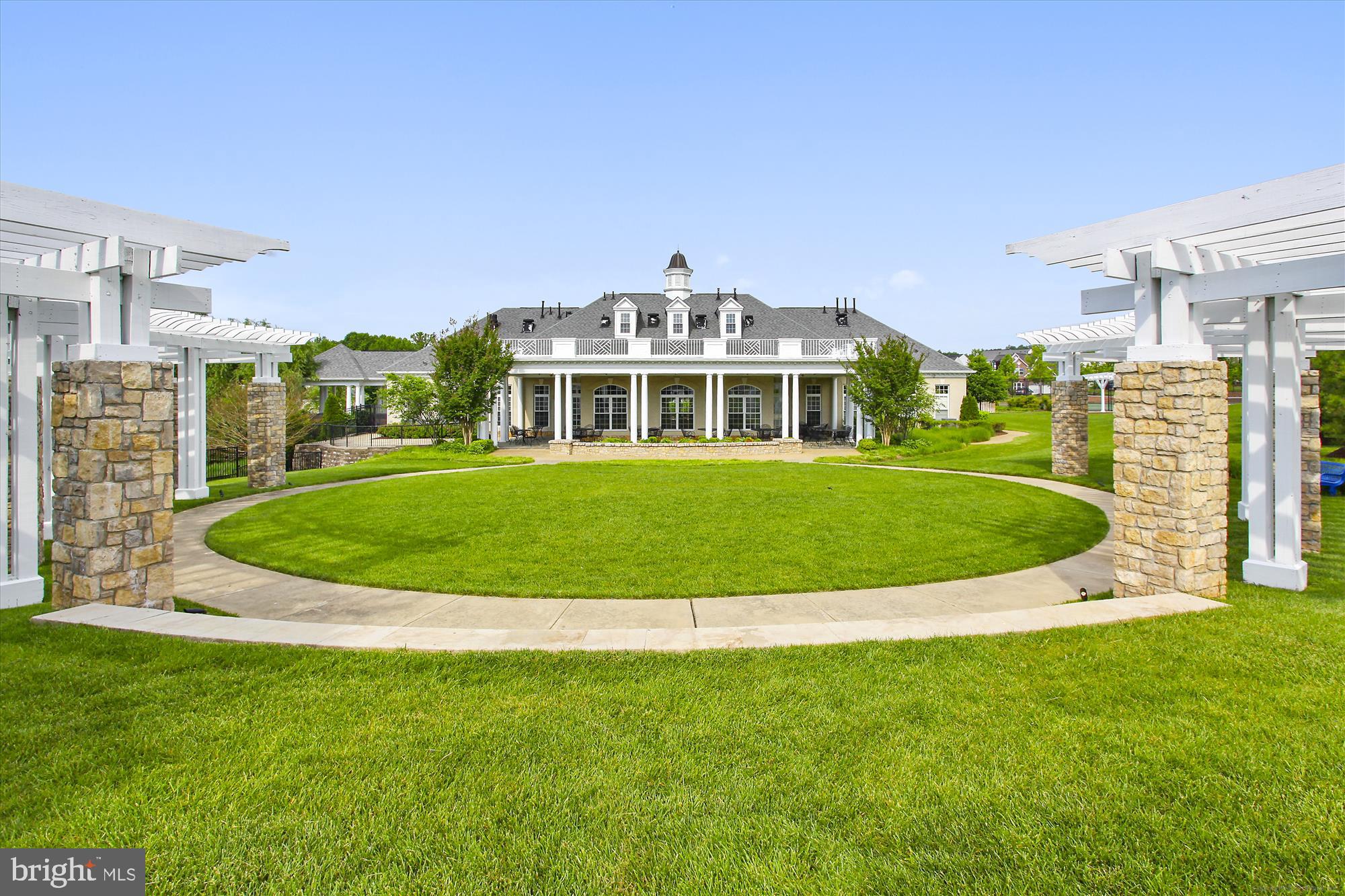 3318 Eagle Ridge Drive Woodbridge, VA 22191 - Photo 57 of 72 a view of a white house with a big yard and large trees