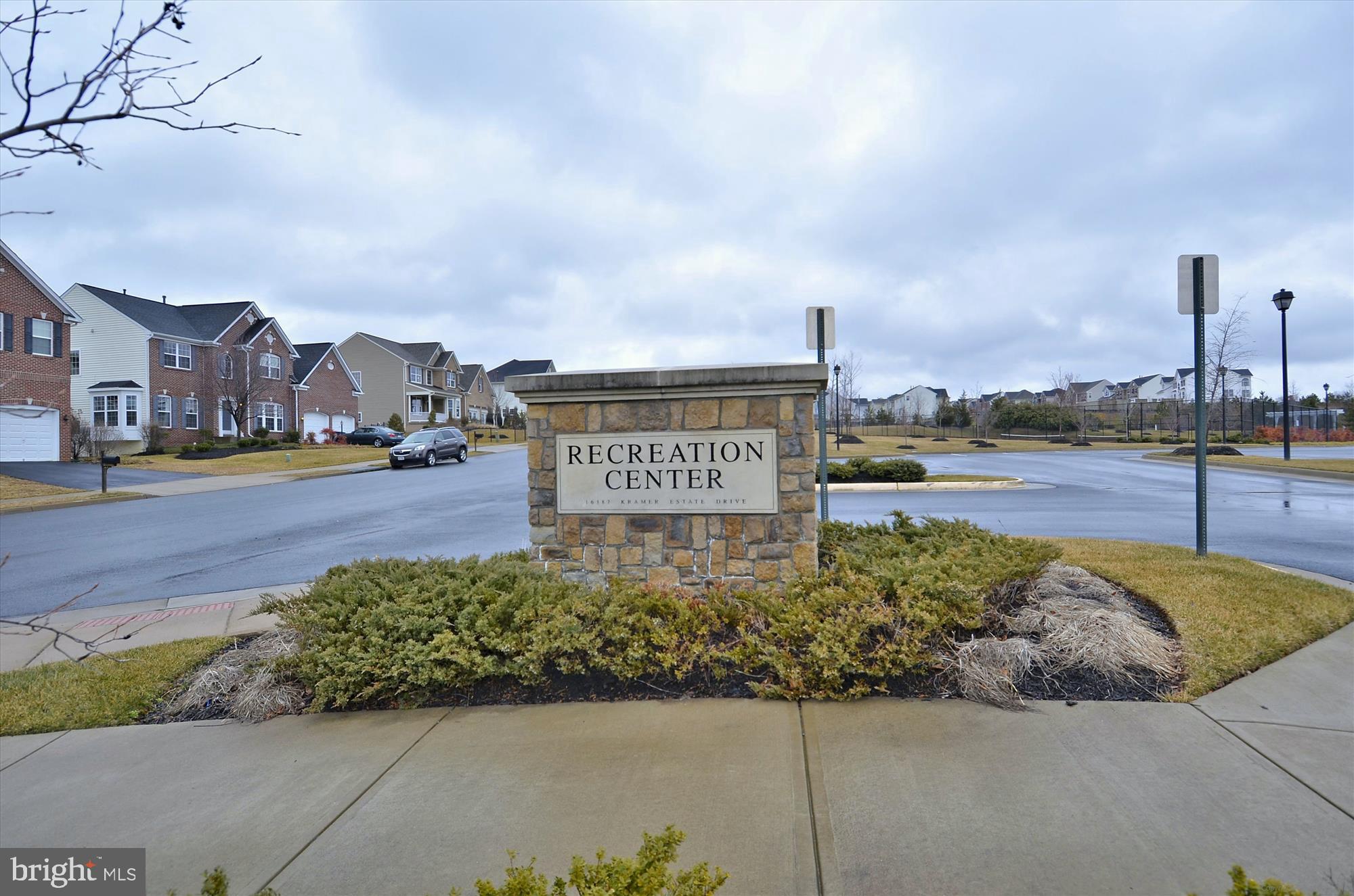 3318 Eagle Ridge Drive Woodbridge, VA 22191 - Photo 59 of 72 a view of a street with houses in the background