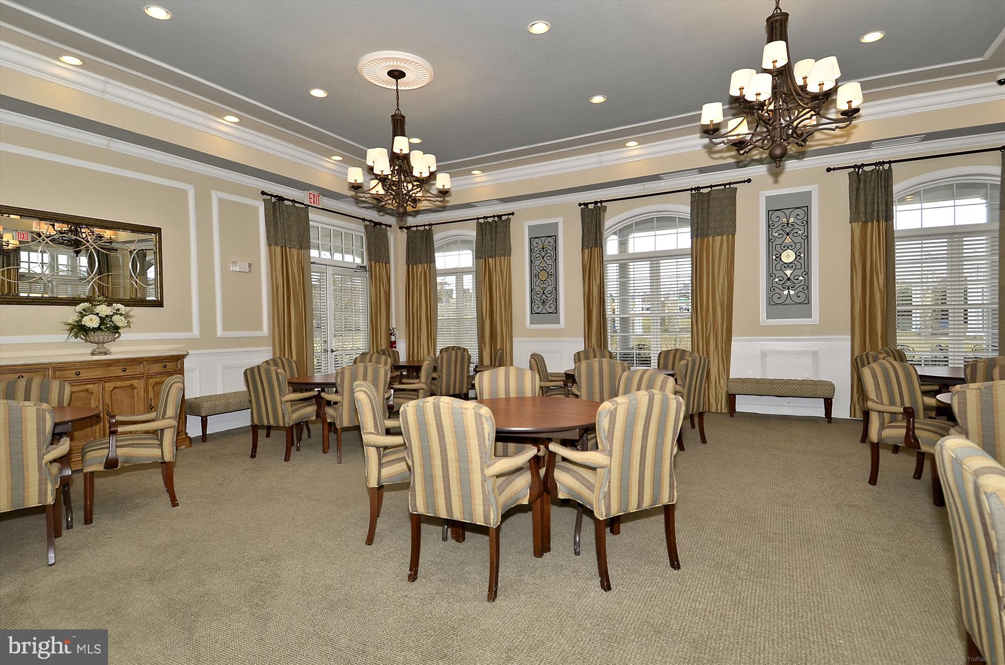 3318 Eagle Ridge Drive Woodbridge, VA 22191 - Photo 63 of 72 a view of a dining room with furniture and a chandelier
