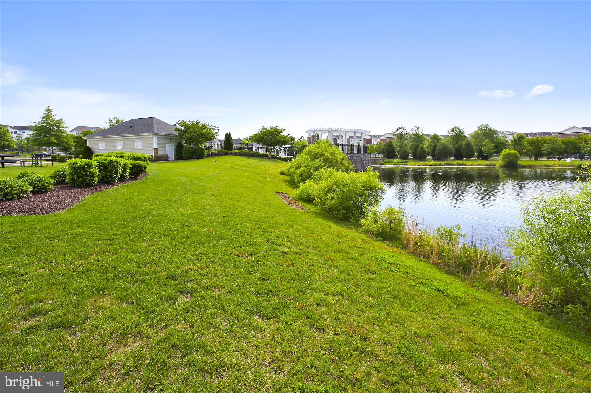 3318 Eagle Ridge Drive Woodbridge, VA 22191 - Photo 69 of 72 a view of a lake with houses in the back