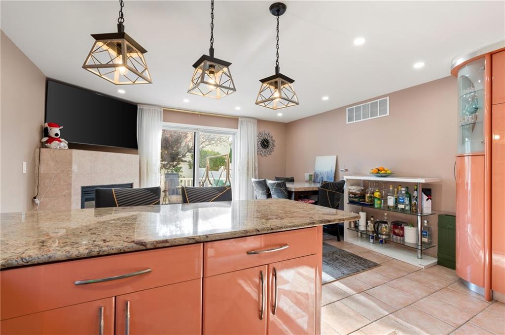 1314 East 69th Street Brooklyn, NY 11234 - Photo 12 of 42 a view of a living room and kitchen