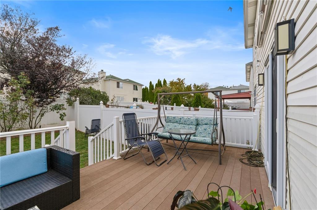 1314 East 69th Street Brooklyn, NY 11234 - Photo 35 of 42 a view of a balcony with chairs