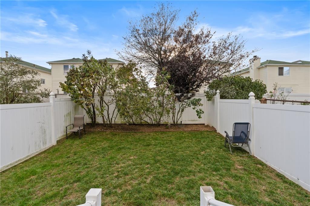 1314 East 69th Street Brooklyn, NY 11234 - Photo 36 of 42 a view of a back yard