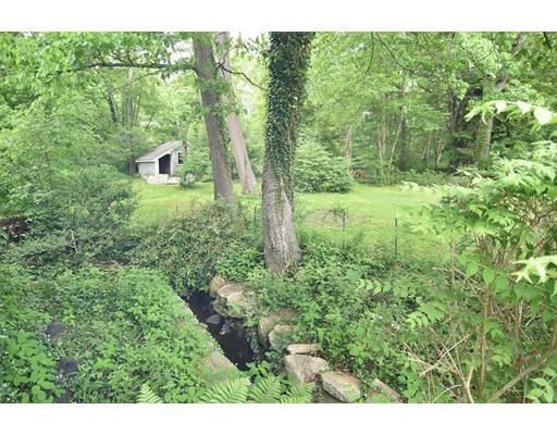 35 Cornell Road Westport, MA 02790 - Photo 2 of 38 a view of a garden with a building