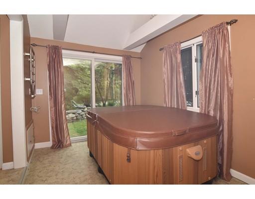 35 Cornell Road Westport, MA 02790 - Photo 26 of 38 a dinning room with a bed and a large window
