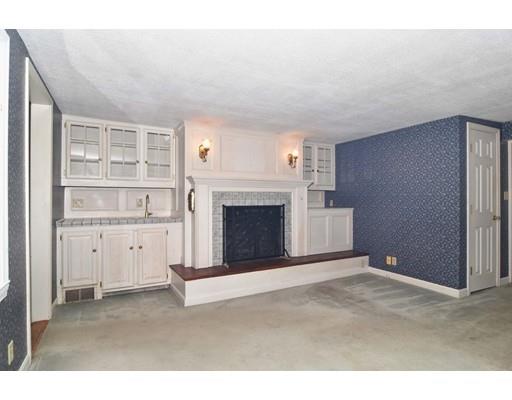35 Cornell Road Westport, MA 02790 - Photo 6 of 38 a view of an empty room with a fireplace
