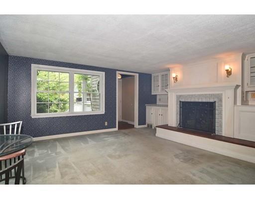 35 Cornell Road Westport, MA 02790 - Photo 7 of 38 a view of an empty room with a window and fireplace