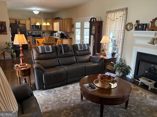 610 Birch Lane Clarkesville, GA 30523 - Photo 14 of 46 a living room with furniture and a fireplace