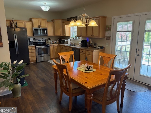 610 Birch Lane Clarkesville, GA 30523 - Photo 16 of 46 a view of a dining room with furniture window and wooden floor